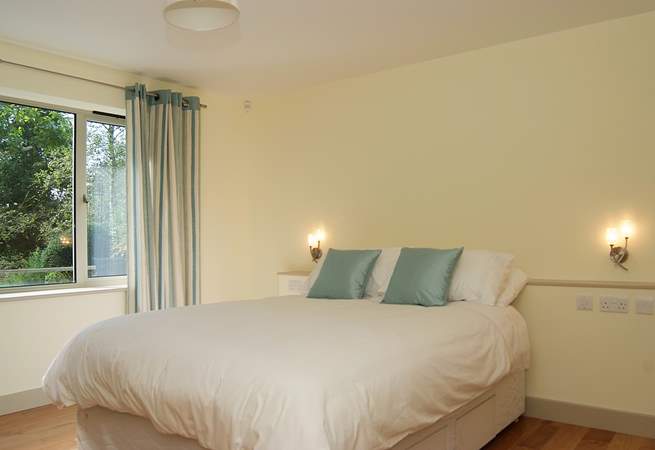 Bedroom 1 has a 5' double bed, an en suite bathroom, and is on the ground floor.