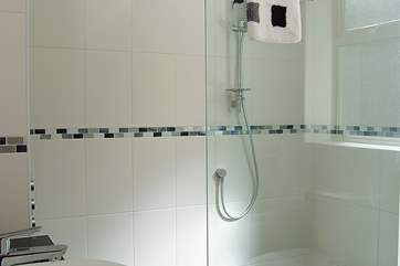 There is a walk-in shower in the en suite bathroom on the ground floor.