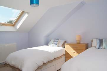 Bedroom 3 has twin beds.