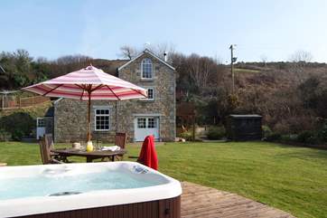 The fabulous hot tub is a real treat for everyone!