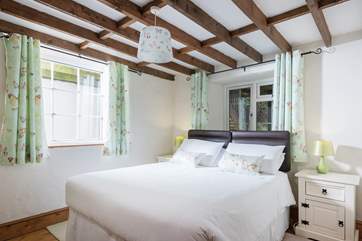 Bedroom 1 with 'zip and link' (5' double or twin) beds and TV/DVD player.