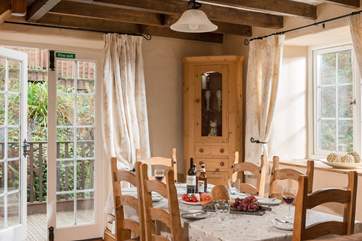 French doors open from the first floor living-room out onto the decked balcony.