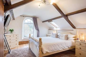 Spacious Bedroom 4 includes a wall-mounted TV/DVD player.