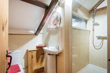 The en suite shower-room to Bedroom 4.