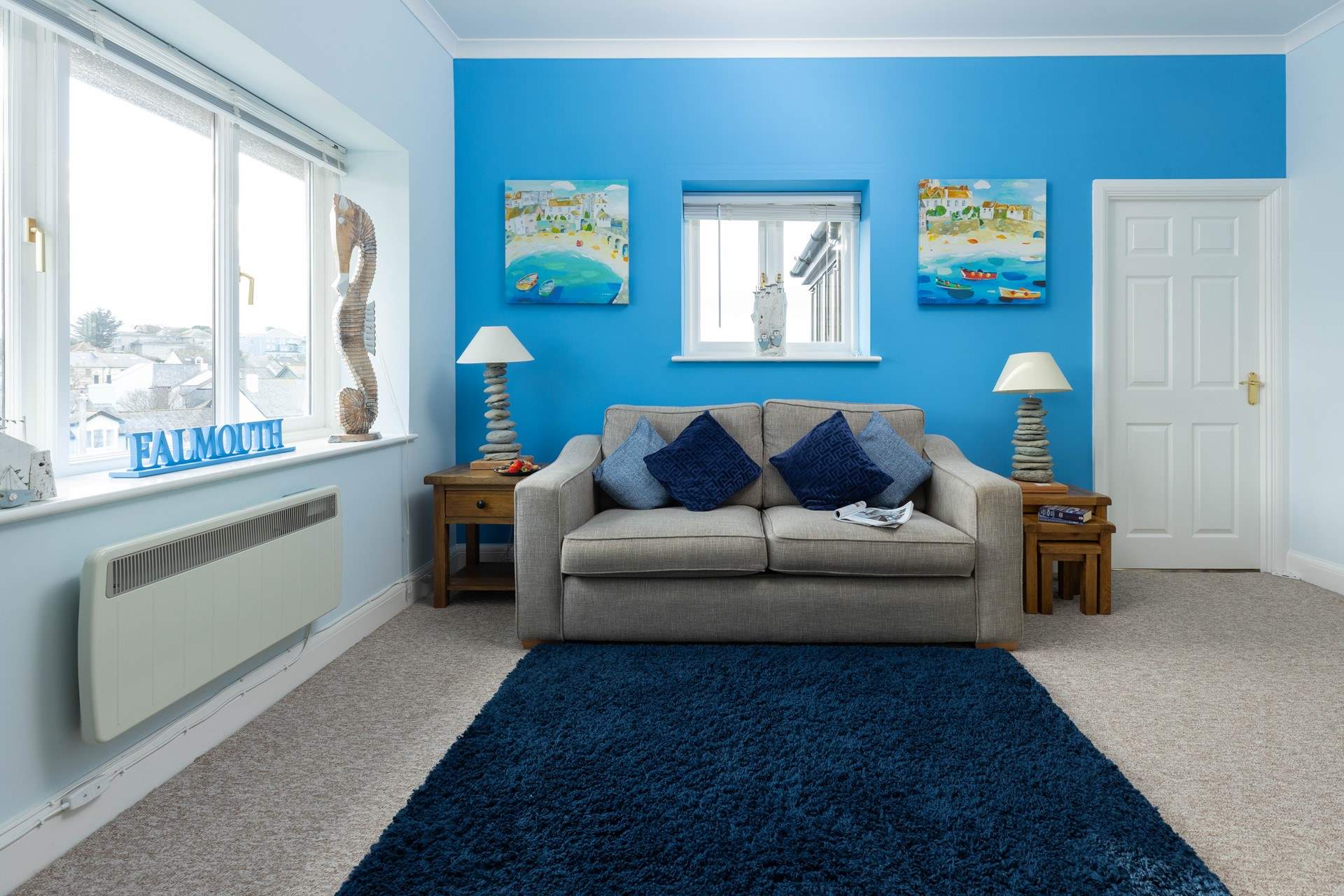 The light and airy sitting-room is a lovely place to relax. 