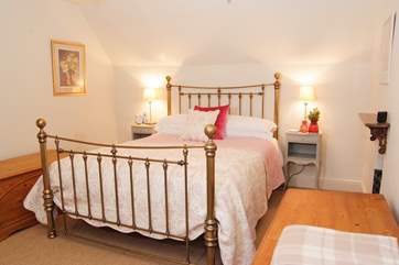 The master bedroom is spacious with a touch of luxury too.