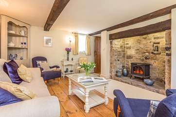 The cottage-style yet elegant living-room is such a calm place to relax in.