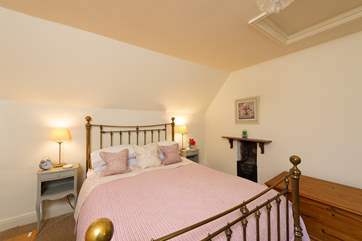 Another view of the pretty main bedroom.