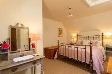 The master bedroom is spacious with a touch of luxury too.
