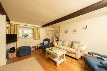 The cottage-style yet elegant living-room is such a calm place to relax in.