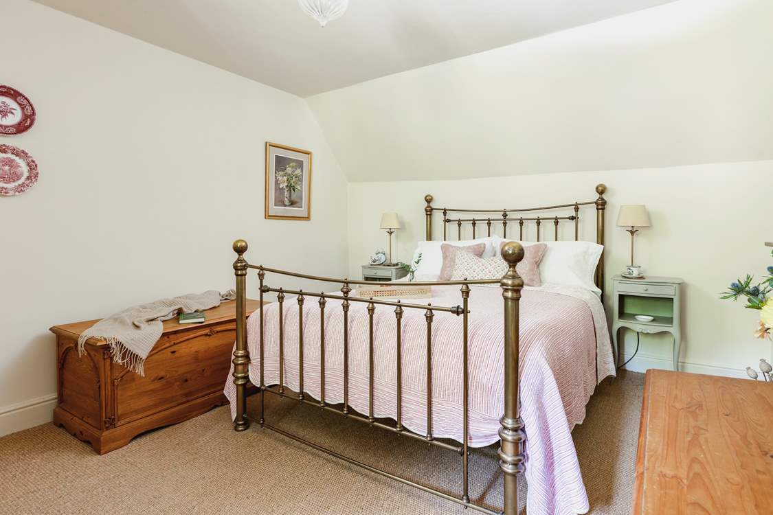 The master bedroom is spacious with a touch of luxury too.
