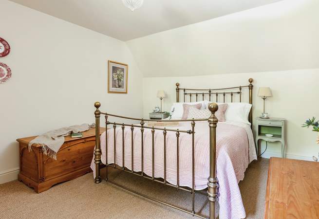 The master bedroom is spacious with a touch of luxury too.