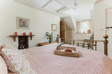 Another view of the pretty main bedroom.