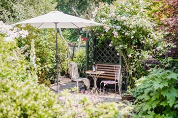 The cottage is embraced by its wonderful garden - an absolute delight of colour and variety.
