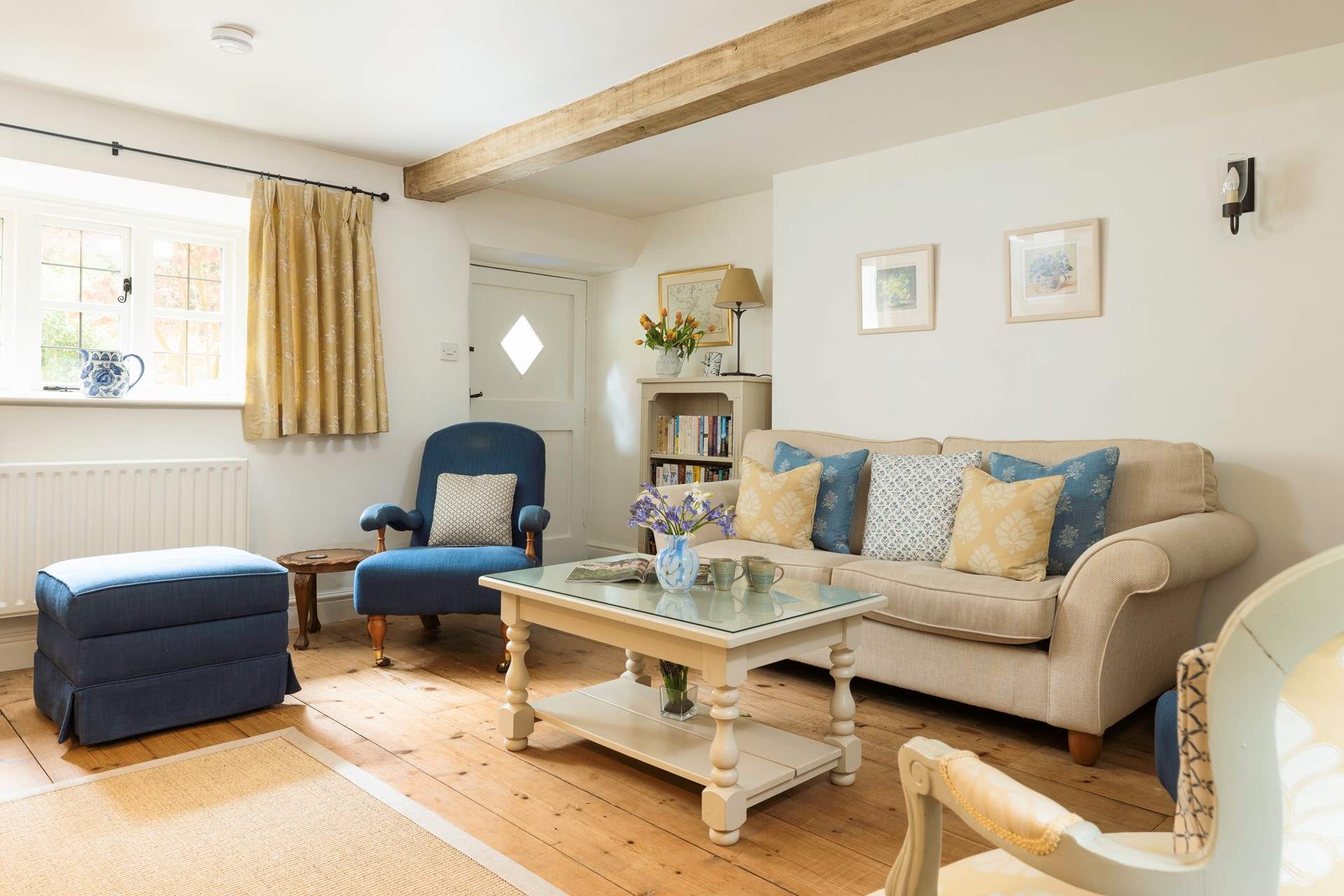 The cottage-style yet elegant living-room is such a calm place to relax in.