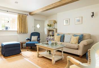 The cottage-style yet elegant living-room is such a calm place to relax in.