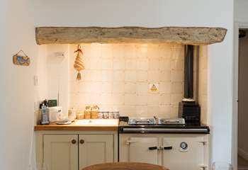 There is a Rayburn to add warmth and character to this farmhouse-style kitchen.
