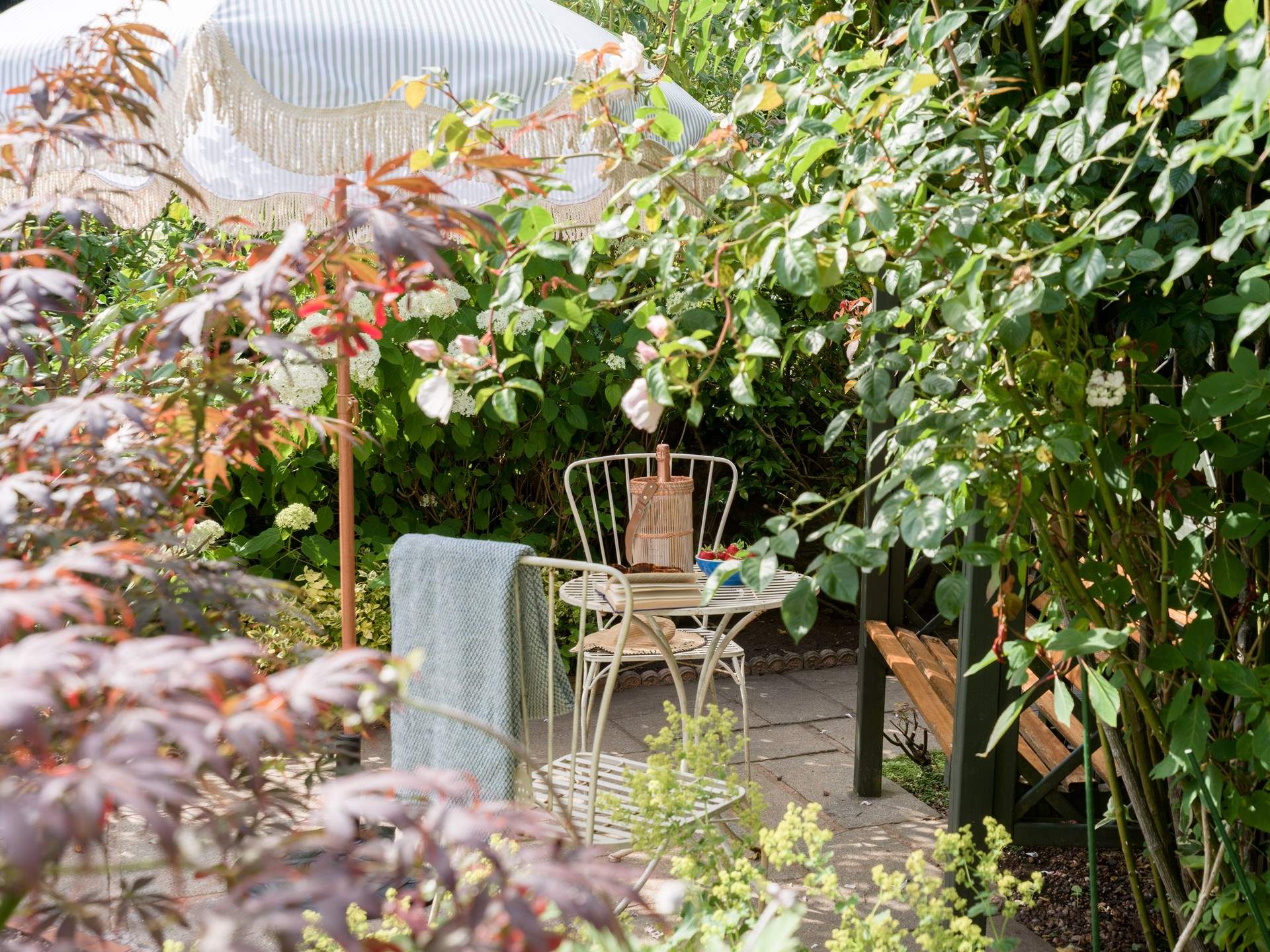 The cottage is embraced by its attractive garden - an absolute delight of colour and variety.