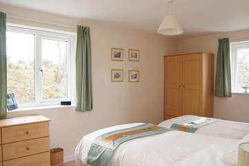 Bedroom 4 is also furnished with twin beds.