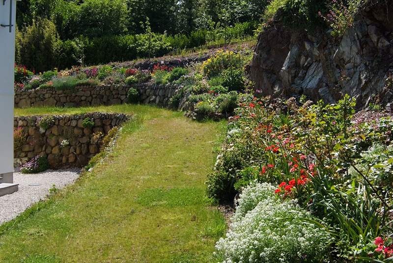 The lawns, beds and borders are all beautifully maintained.