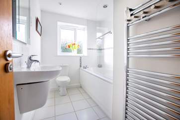 The main bathroom has a shower and bath.