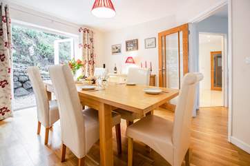 The separate dining-room also has doors opening out to the back garden.