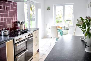 Doors open out to the garden from the kitchen/breakfast-room.