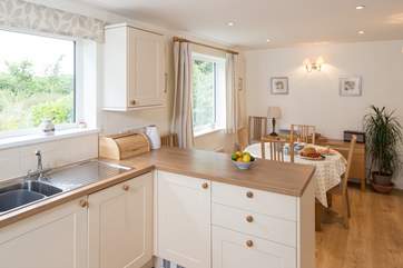 The spacious kitchen/dining-room is carefully equipped to make this a real home-from-home.