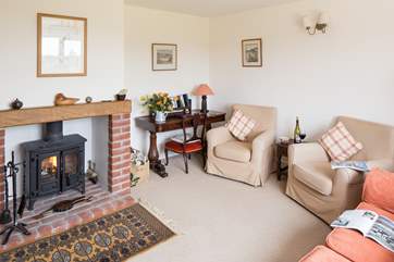 The sitting-room has a cosy wood-burner, making this a great place to stay all year round.