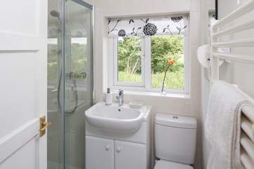 In addition to the downstairs cloakroom, there is a shower-room upstairs.
