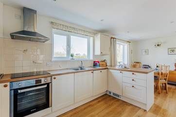 The spacious kitchen/dining-room is carefully equipped to make this a real home-from-home.