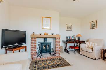 The sitting-room has a cosy wood-burner, making this a great place to stay all year round.