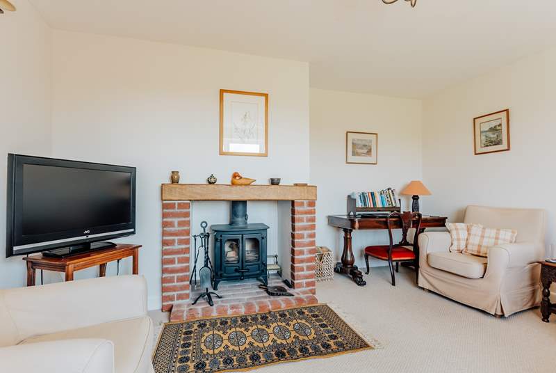 The sitting-room has a cosy wood-burner, making this a great place to stay all year round.