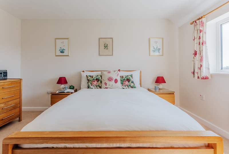 The second double bedroom is just as spacious as the first, with far-reaching rural views across the garden.