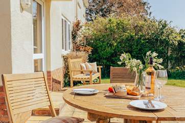 The pretty garden is a suntrap - enjoy some lunch in the sun