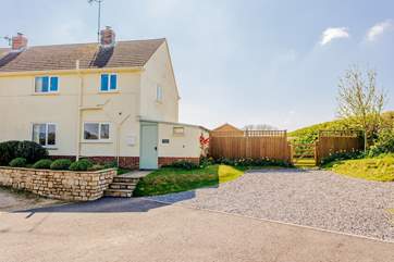 The parking area to the side of the cottage is plenty of space for 2 cars.