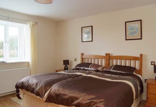 On the ground floor, bedroom 1 is furnished with versatile 'zip and link' (double or twin) beds.
