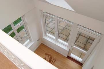 Looking down into the dining-area from the galleried play-area (please take care with younger children).