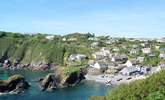 Looking back at picturesque Cadgwith Cove from the clifftop footpath just beyond the village... - Thumbnail Image