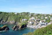 Looking back at picturesque Cadgwith Cove from the clifftop footpath just beyond the village...