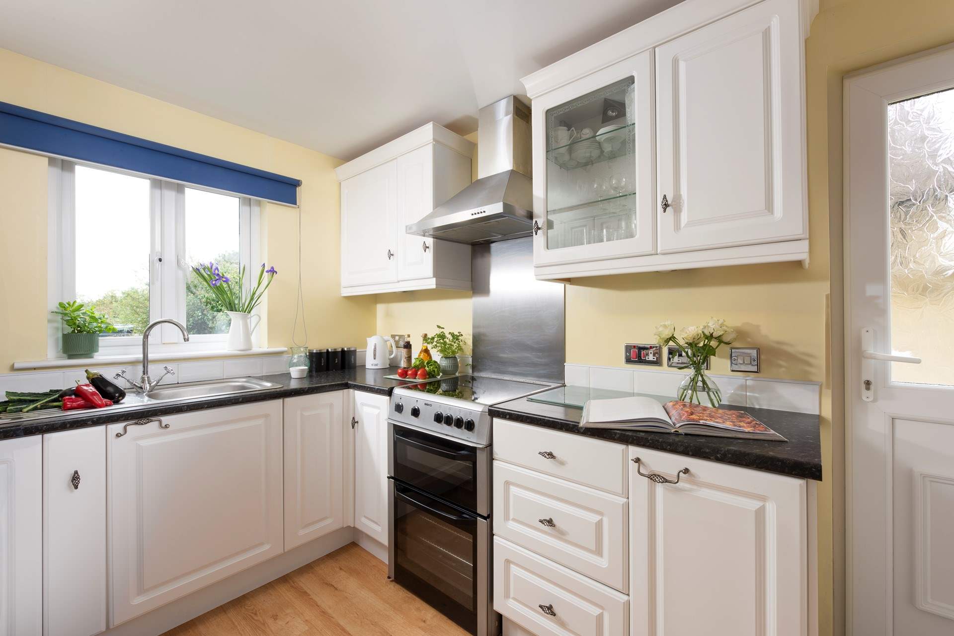 The kitchen overlooks the garden.