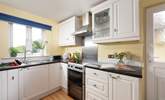 The kitchen overlooks the garden. - Thumbnail Image