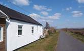 Sea Cottage is in a unique position with direct access to the beach and the Tarka Cycle Trail, with the local cricket club and access track to the cottage on the other side of the Cottage. - Thumbnail Image