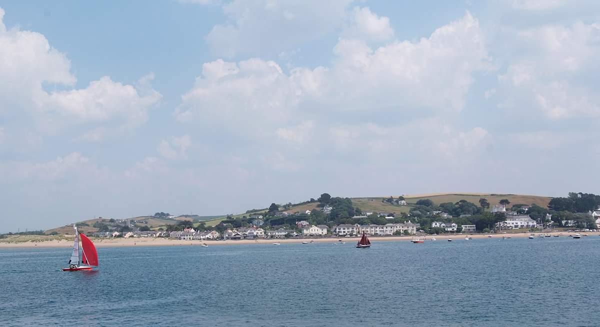 Sea Cottage is tucked away in the sand dunes to the left of this photograph of Instow.