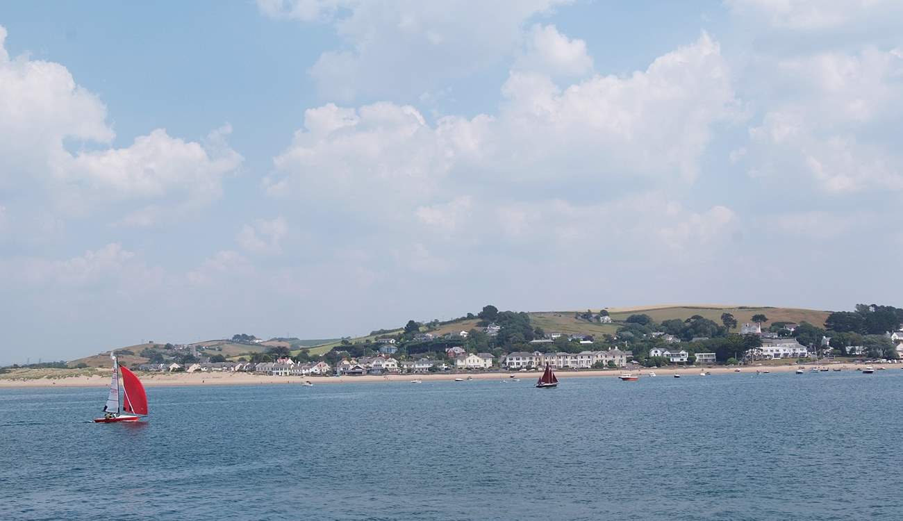 Sea Cottage is tucked away in the sand dunes to the left of this photograph of Instow.