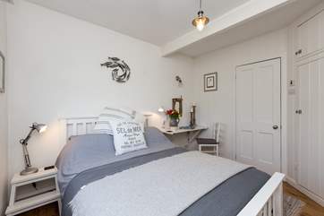 Another view of the main bedroom, the en suite is through the middle door.