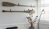 Vintage oars make charming wall art. - Thumbnail Image