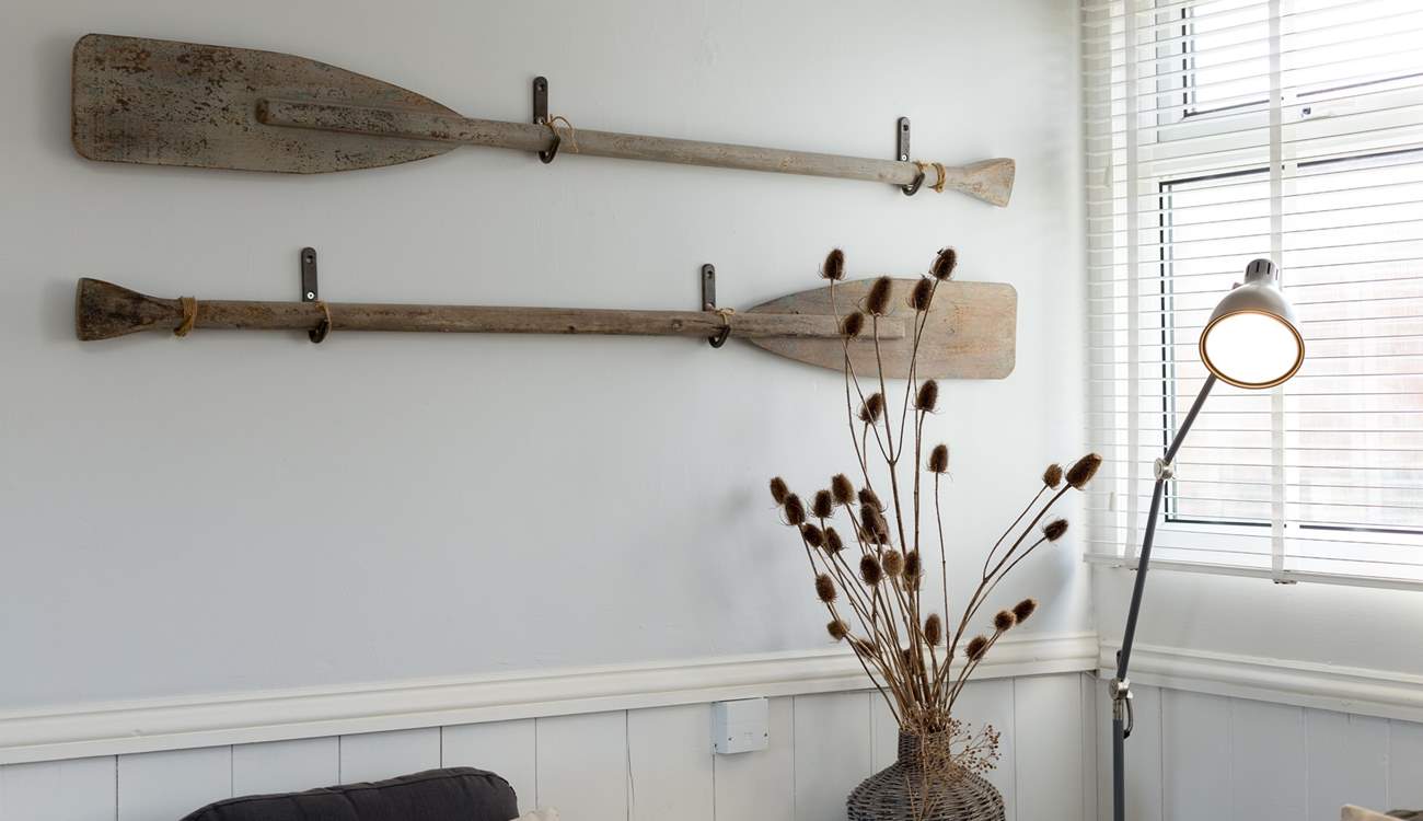 Vintage oars make charming wall art.