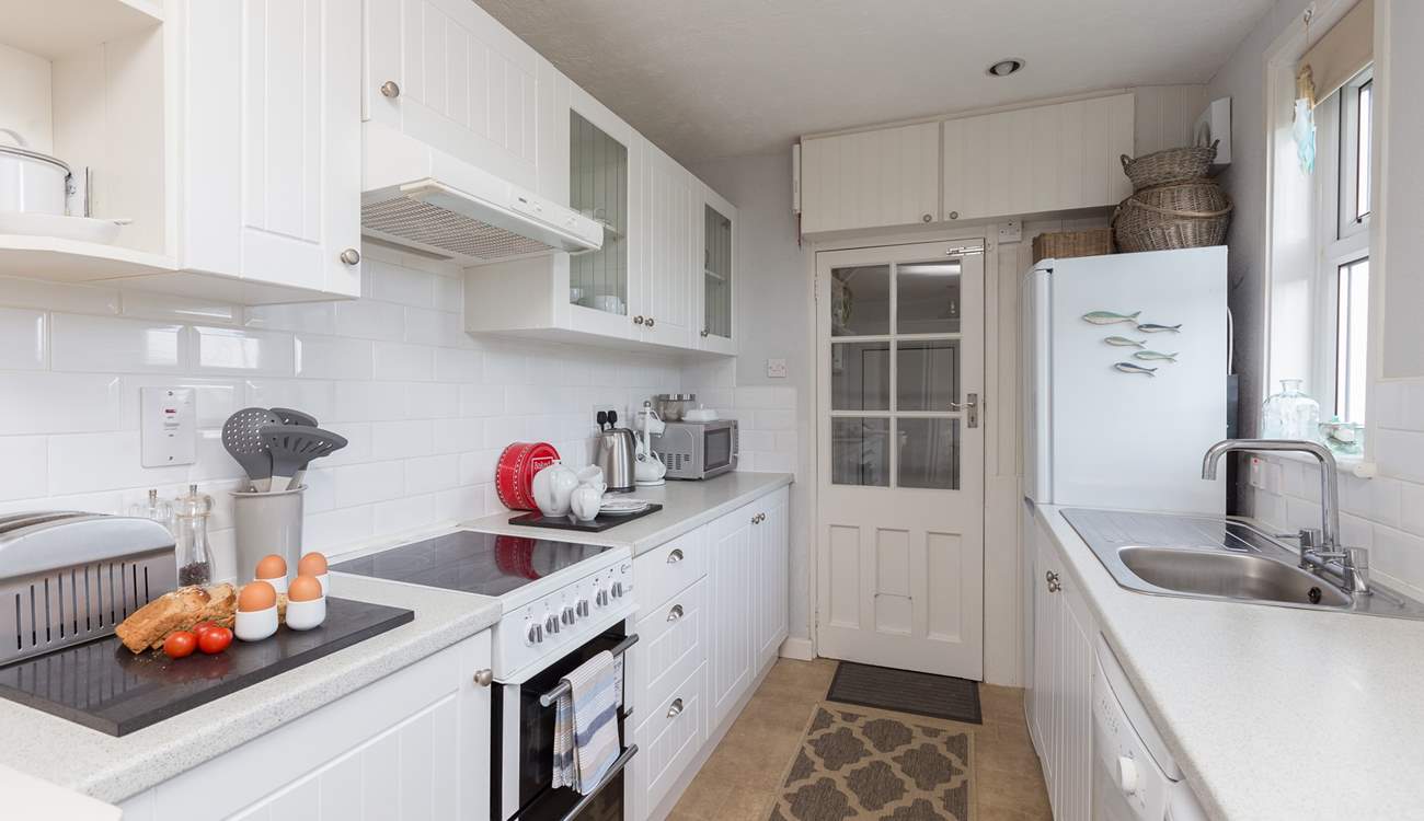 This is looking back towards the entrance. There is a second shower to one side of the entrance lobby and a separate WC to the other.