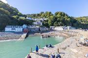 Sit by the harbour at Clovelly and take in the lovely view of the village.